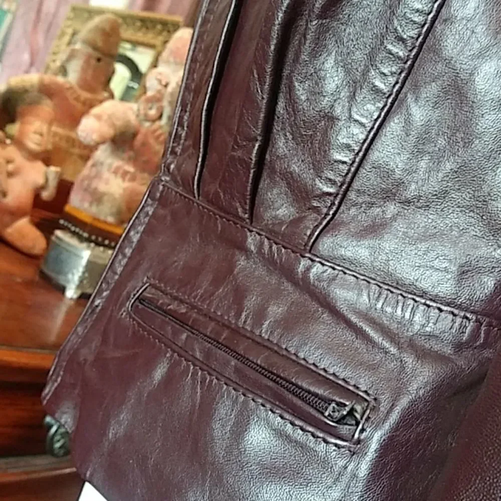 Bermans. Dark burgendy leather jacket